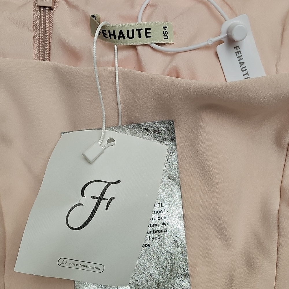 Elegant Pink A-Line Dress with Cutout Hem - Picture 13 of 13